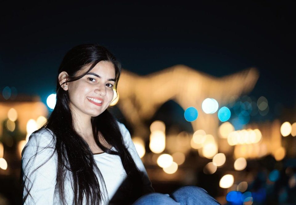 How can I design a website that encourages repeat visits?